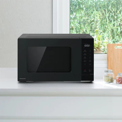 PANASONIC 25 LITER COMPACT SOLO MICROWAVE OVEN Model NN-ST34NB